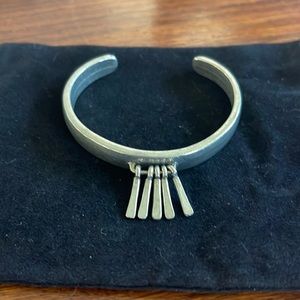 Elegant Silver Bracelet with Unique Charm